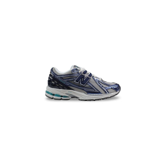 Athletic Sneakers by New Balance for women in synthetic textile & mesh bicolour features an exquisite silhouette, showcasing the premium athletic style of the Women's Athletic Synthetic Textile & Mesh Sneakers with an exquisite finish.
