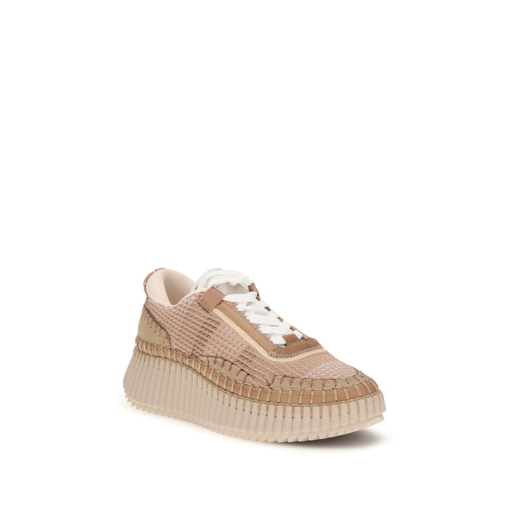 Athletic Sneakers by Chloé for women in nylon polyester & cotton beige & monogram presents a sleek silhouette, perfectly capturing the athletic style essence of Women's Athletic Nylon Polyester & Cotton Sneakers with its sleek design and premium finish.