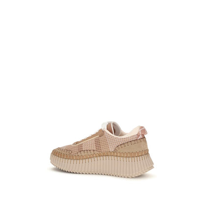 Athletic Sneakers by Chloé for women in nylon polyester & cotton beige & monogram showcases a architectural silhouette, artfully capturing the essence of the Women's Athletic Nylon Polyester & Cotton Sneakers with its signature architectural athletic style construction.