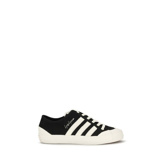Sneakers by Y-3 for men in bos taurus calf leather & rubber black features an timeless silhouette from the Men's Low Top Bos Taurus Calf Leather & Rubber Sneakers collection, showcasing a signature low-top style with an timeless finish.