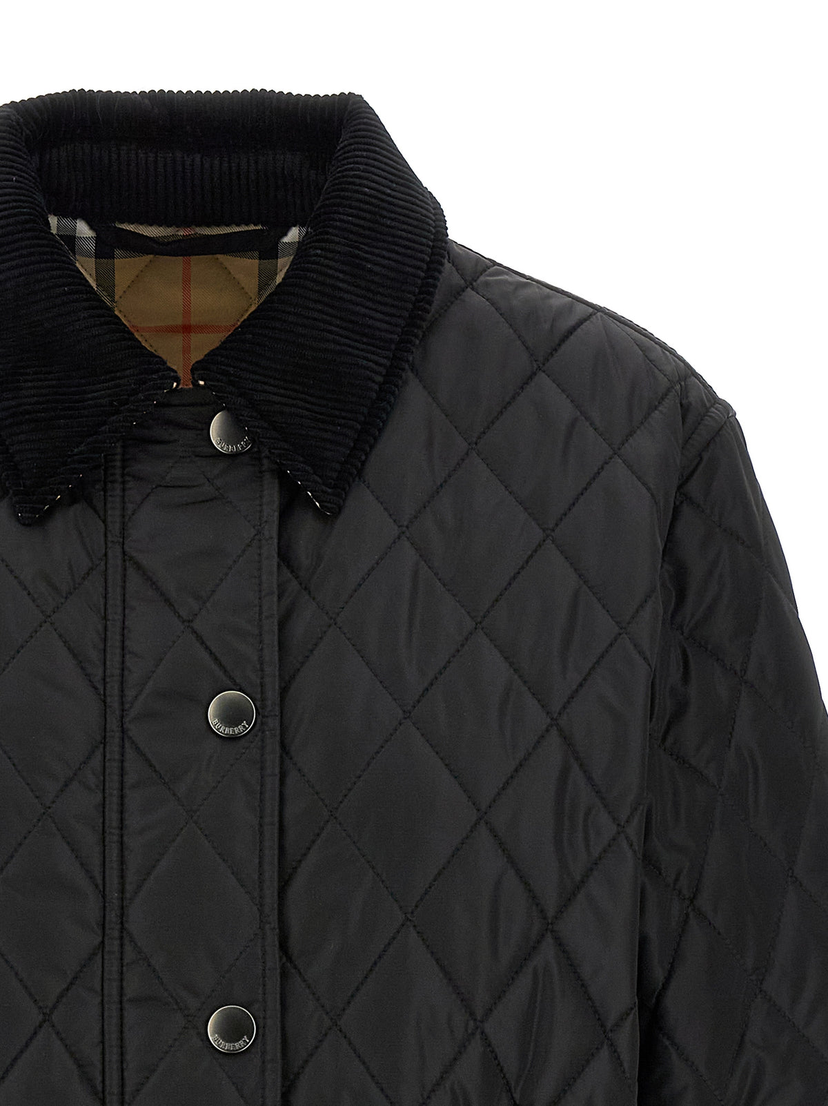 Overcoat by Burberry for women in nylon cotton corduroy twill black features an satoral silhouette, showcasing a sophisticated and satoral lightweight & pockets for a premium, timeless look.