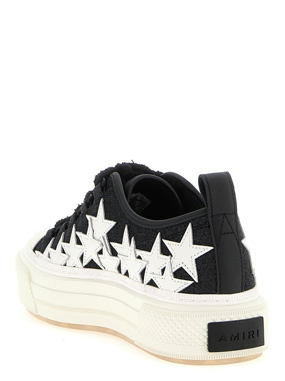 Sneakers by Amiri for women in calfskin leather bicolour, black & white features a chic design, perfectly showcasing the chic low-top style of this Women's Low Top Calfskin Leather Sneakers.