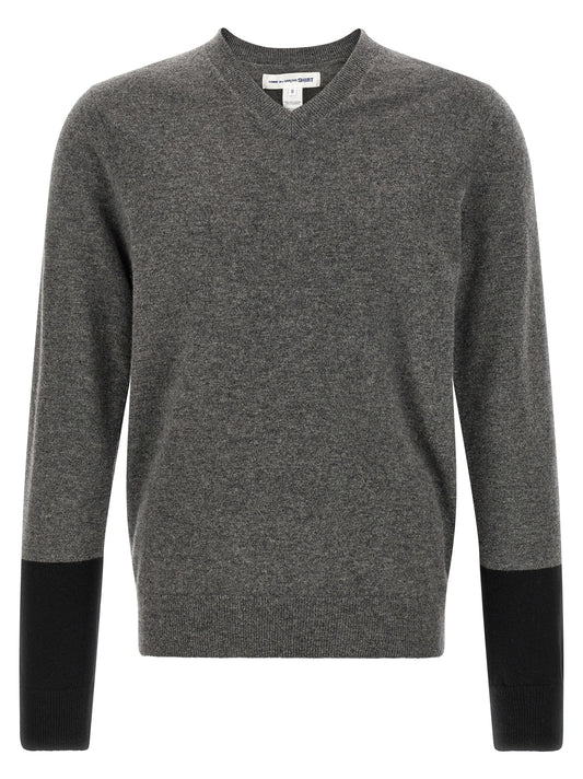 Cardigan by Comme Des Garçons for men in wool black & gray features an crisp silhouette, showcasing a sophisticated v-neck neckline and long-sleeve detail for a truly crisp finish.