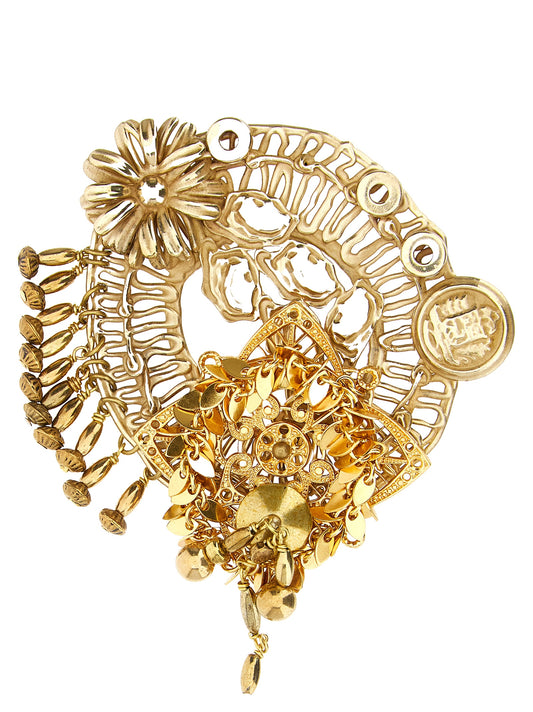 Booche by Dries Van Noten for women in lambskin leather gold & floral showcases a on trend silhouette, artfully capturing the essence of the on trend Women's Gold Brass Booche design for a sophisticated look.