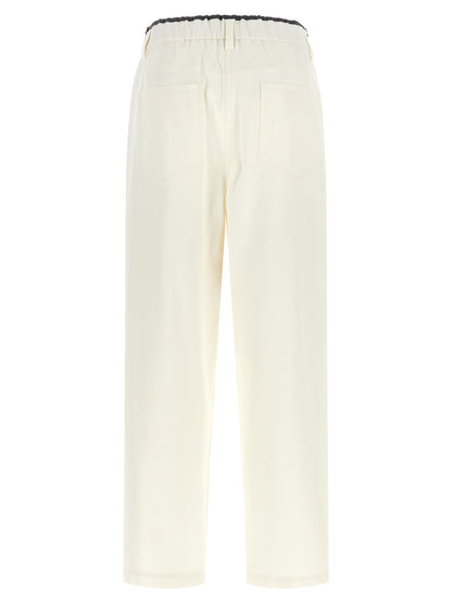Trousers by Brunello Cucinelli for women in cotton white & signature features a sculptural silhouette, showcasing a sculptural straight-leg & relaxed-fit and long with a sophisticated for a sculptural finish.