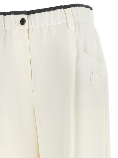 Trousers by Brunello Cucinelli for women in cotton white & signature features an on trend silhouette, showcasing a sophisticated straight-leg & relaxed-fit with a long and for an on trend finish.
