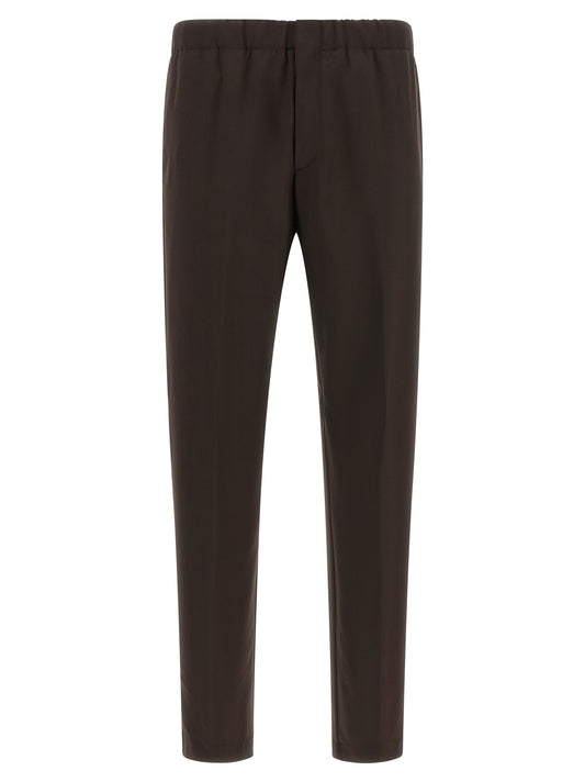 Trousers by Lardini for men in virgin wool brown presents a smart silhouette, meticulously detailed with a smart straight-leg & relaxed-fit, a smart long, and a smart .
