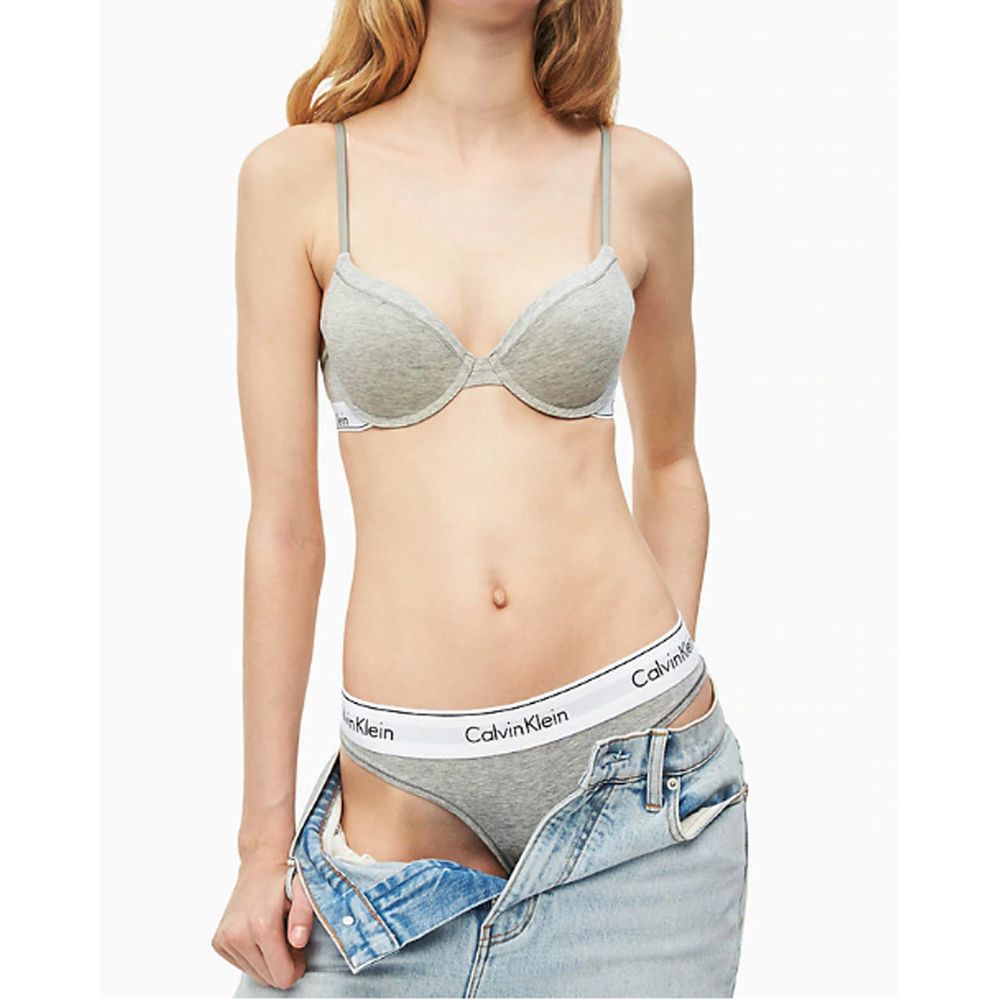 Thongs by Calvin Klein Underwear for women in stretch modal cotton gray features a edgy silhouette, showcasing the edgy design of this Women's Stretch Modal Cotton Thongs.