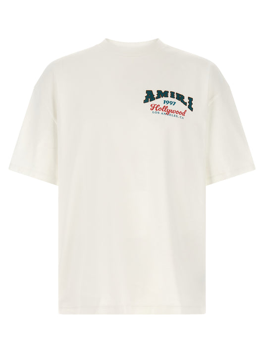 T-Shirt by Amiri for men in modacrylic & cotton white, patterned, monogram & print showcases a dramatic silhouette, elegantly detailed with a dramatic crew neckline and short-sleeve for a truly dramatic finish.