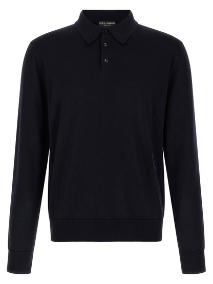 Polo Shirt by Dolce & Gabbana for men in virgin wool navy & monogram presents a crisp silhouette, artfully detailed with a crisp long-sleeve and crisp shirt-collar neckline.