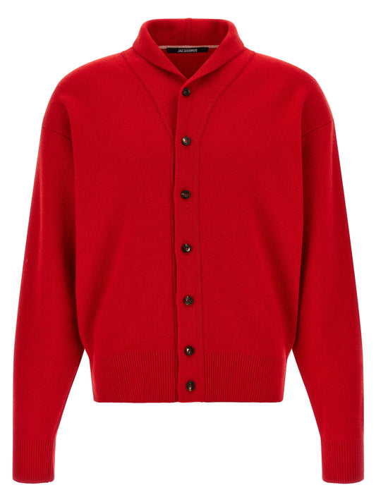 Cardigan by Jacquemus for men in cashmere & merino wool red showcases a captivating silhouette, artfully detailed with a captivating and shawl-collar neckline for a truly sophisticated captivating look.