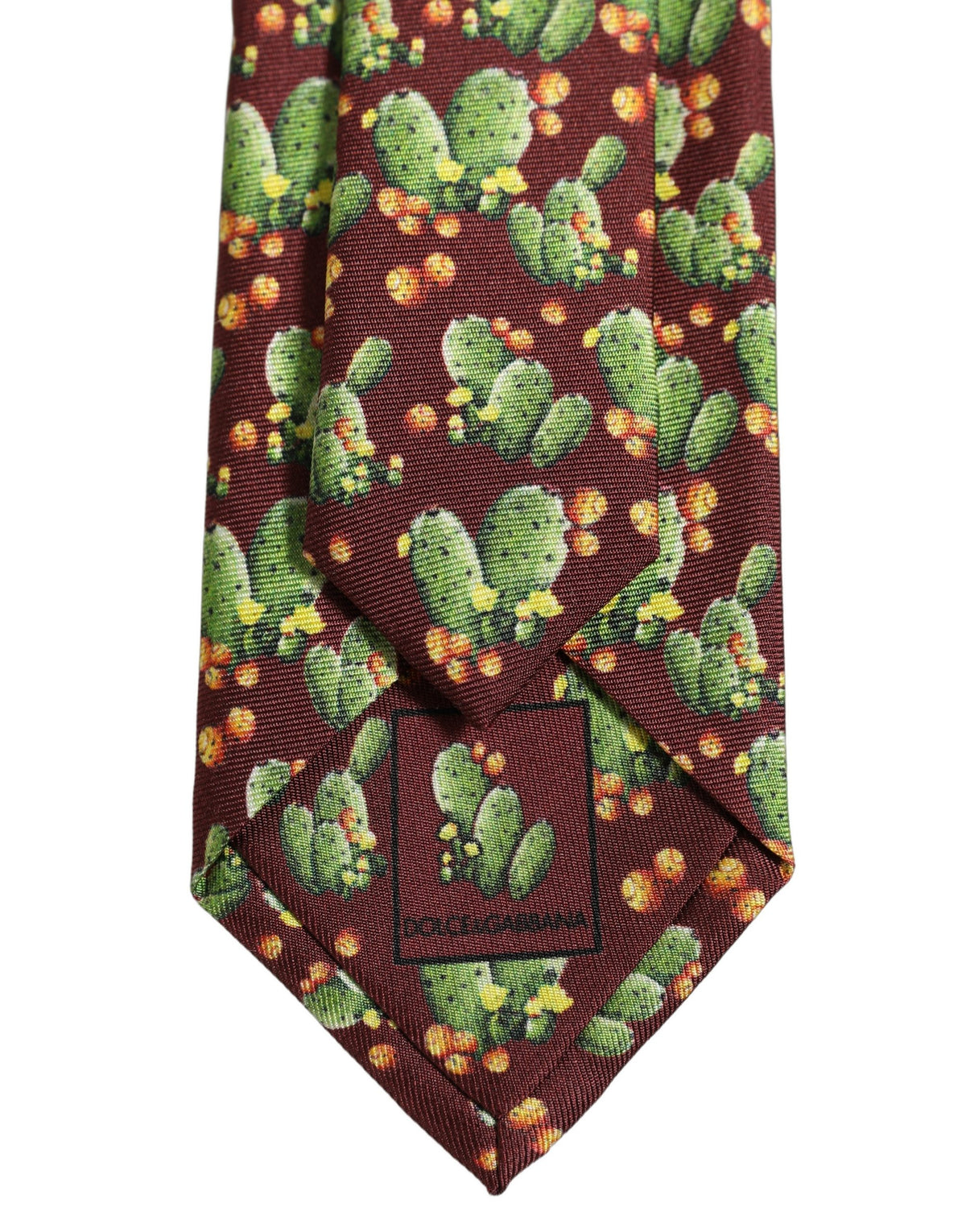 Necktie by Dolce & Gabbana for men in silk maroon & floral features a distinguished silhouette, artfully capturing the essence of the distinguished Silk Necktie design for a sophisticated look.