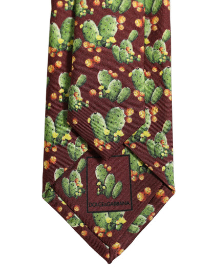 Necktie by Dolce & Gabbana for men in silk maroon & floral features a distinguished silhouette, artfully capturing the essence of the distinguished Silk Necktie design for a sophisticated look.
