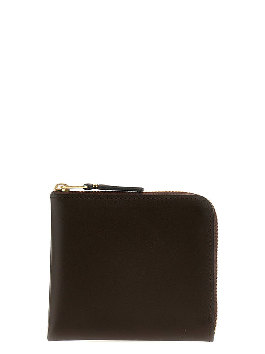 Cardholder Card Case by Comme Des Garçons for women in cowhide leather brown & print features an dynamic silhouette from the Classic Line Cowhide Leather Cardholder Card Case collection, highlighting dynamic card-organization compact-design for a premium and sophisticated look.
