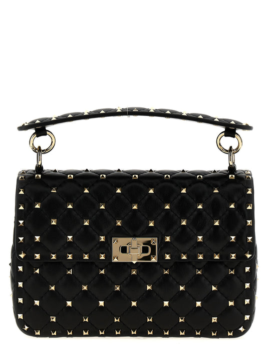 Shoulder Flap Bag by Valentino Garavani for women in lamb leather black presents a versatile silhouette, showcasing a secure flap and versatile with versatile shoulder-strap & handle for a sophisticated look.