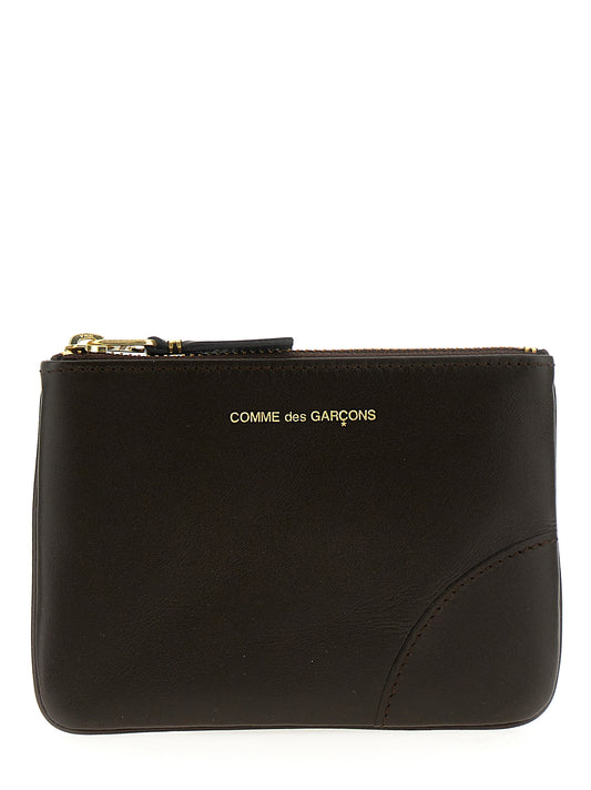 Cardholder Card Case by Comme Des Garçons for unisex in calfskin leather brown & print features a distinguished silhouette, showcasing the distinguished design of the Calfskin Leather Cardholder Card Case with refined card-organization.