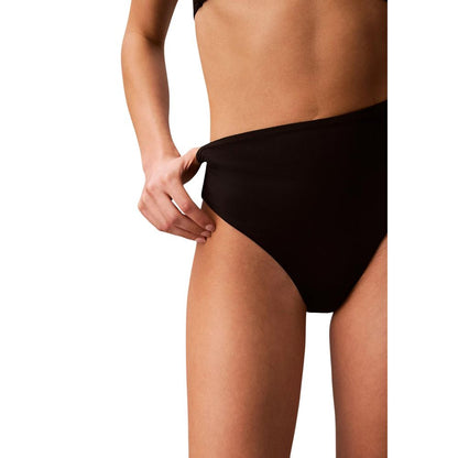 Bikini by Calvin Klein Jeans for women in lycra polypropylene & metal black features an riviera chic silhouette that beautifully encapsulates the signature aesthetic of the Women's Lycra Polypropylene & Metal Bikini.