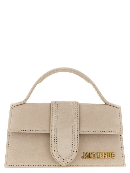 Flap Handbag by Jacquemus for women in suede calfskin leather beige & natural features an refined silhouette, showcasing a secure flap & magnetic, ample , and versatile shoulder-strap, adjustable-strap & handle for a sophisticated refined aesthetic.