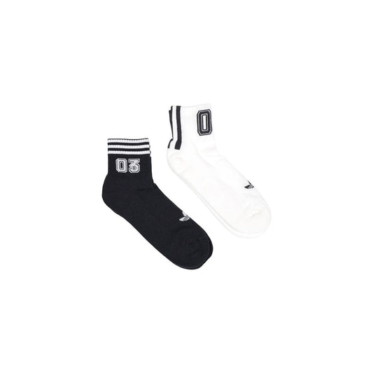 Socks by Adidas Originals for men in stretch poly cotton black, white & striped features an utilitarian chic finish from the Men's Stretch Poly Cotton Socks collection, offering an utilitarian chic fit that ensures sophisticated comfort.