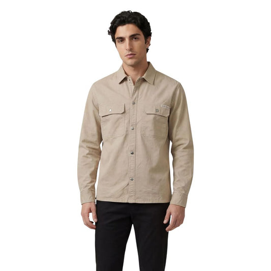 Shirt by Calvin Klein Jeans for men in stretch denim cotton beige showcases a sharp silhouette, elegantly detailed with a sharp and sharp .