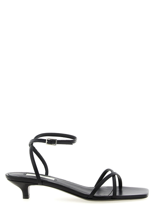 Mid-Heel Ankle Strap Sandals Pumps Heels by TOTEME for women in leather black showcases a exquisite silhouette, perfectly accentuating Women's Leather Mid-Heel Ankle Strap Sandals Pumps Heels with a exquisite mid-heel and exquisite .