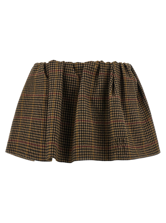 Skirt by Miu Miu for women in virgin wool brown & houndstooth showcases a sultry silhouette, elegantly defined by its mini long and the sophisticated sultry design of the Women's Virgin Wool Mini Long Skirt.