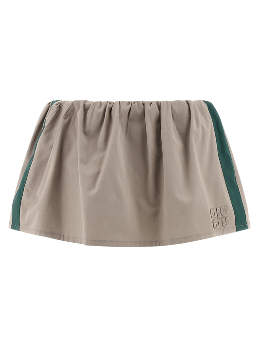 Skirt by Miu Miu for women in cotton twill gray features an tailored silhouette, artfully capturing the essence of Women's Cotton Twill Mini Long Skirt in a sophisticated mini long.