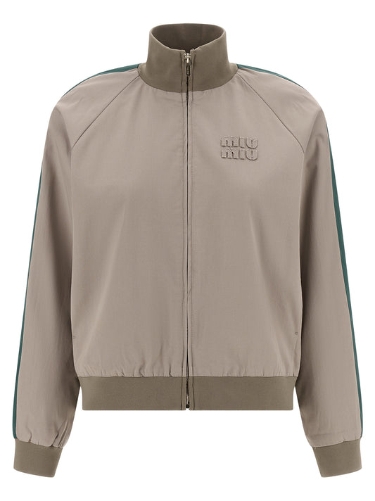 Bomber Jacket by Miu Miu for women in cotton twill gray features a city-ready silhouette, detailed with pockets and a city-ready high-neck neckline.