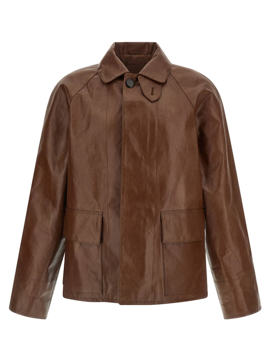 Jacket by Prada for men in calfskin leather brown features an utilitarian silhouette with a refined shirt-collar neckline, showcasing sophisticated pockets for an utilitarian aesthetic.