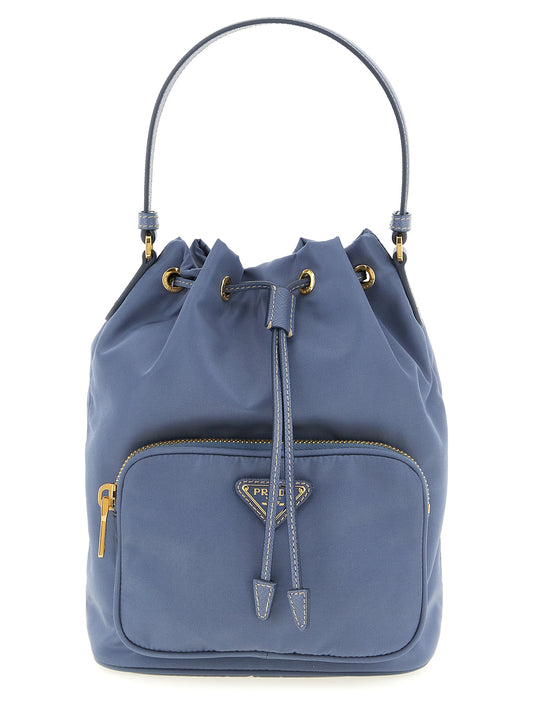 Bucket Handbag by Prada for women in nylon polyamide & saffiano leather blue presents a ornamental silhouette, showcasing a secure zipper & drawstring, ample , and versatile shoulder-strap, adjustable-strap & handle for a ornamental finish.
