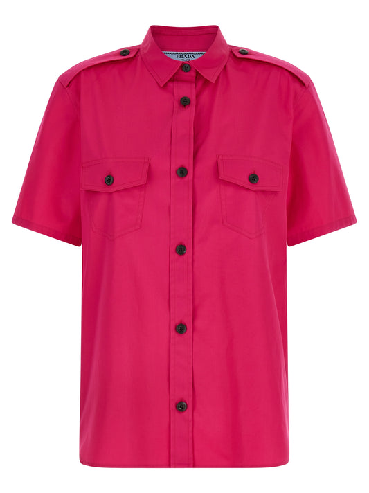 Blouse by Prada for women in cotton fuchsia showcases a sharp silhouette, elegantly detailed with a sharp and sharp short-sleeve.