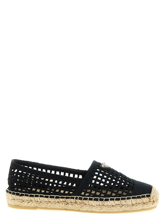 Espadrilles Flat Shoes by Prada for women in cotton metal & rubber black presents a effortless chic silhouette, showcasing the Crochet Women's Cotton Metal & Rubber Espadrilles Flat Shoes design with a effortless chic and for a sophisticated look.