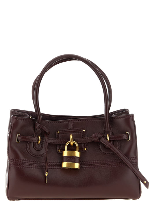 Small Shoulder Shopper Tote Bag by Chloé for women in suede lambskin leather burgundy features a distinguished silhouette, showcasing a secure snap, zipper & hook and distinguished with versatile shoulder-strap, adjustable-strap, belt-strap & handle for a distinguished finish.