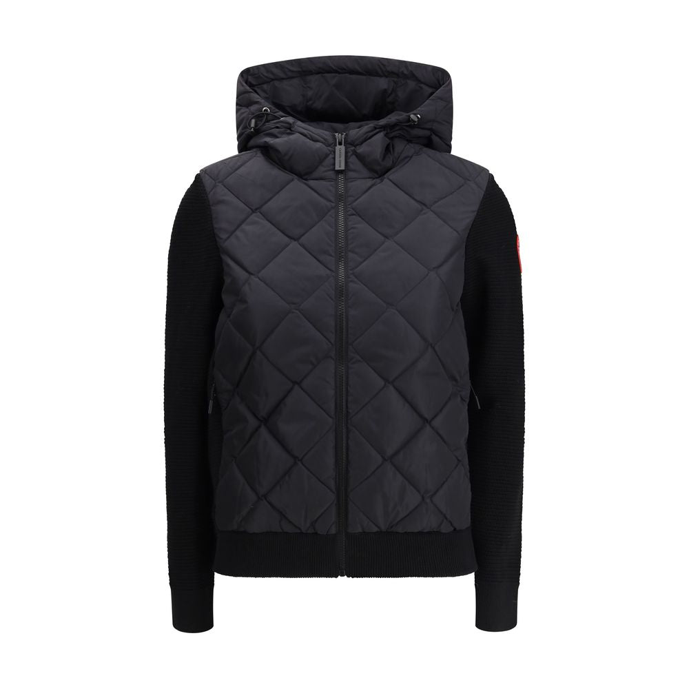 Hooded Puffer Jacket by Canada Goose for women in merino wool black features a city-ready silhouette, detailed with thermal, pockets, hooded & insulated and a city-ready hooded neckline.