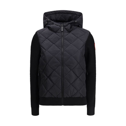Hooded Puffer Jacket by Canada Goose for women in merino wool black features a city-ready silhouette, detailed with thermal, pockets, hooded & insulated and a city-ready hooded neckline.
