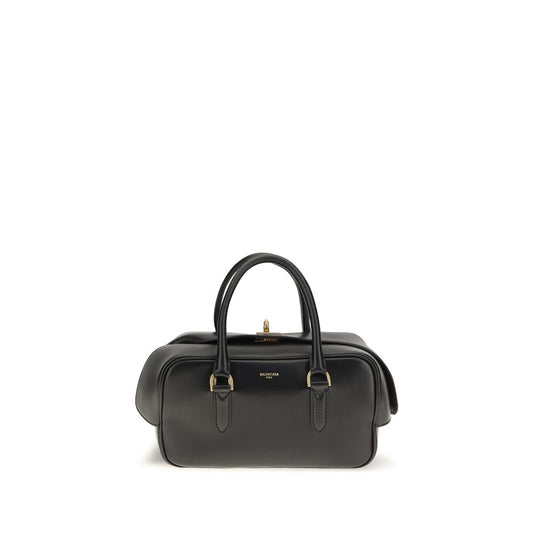 Mini Crossbody Bowling Dome Handbag by Balenciaga for women in lambskin leather black & gold presents a ornamental silhouette, showcasing a secure zipper, ample built-in-compartments, and versatile crossbody-strap, shoulder-strap, handle & adjustable-strap for a ornamental finish.