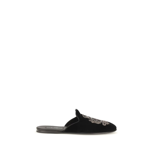 Flat Slippers Shoes by Dolce & Gabbana for men in leather satin & velvet black showcases a timeless silhouette from the Men's Leather Satin & Velvet Flat Slippers Shoes collection, featuring a timeless flat and for a timeless finish.