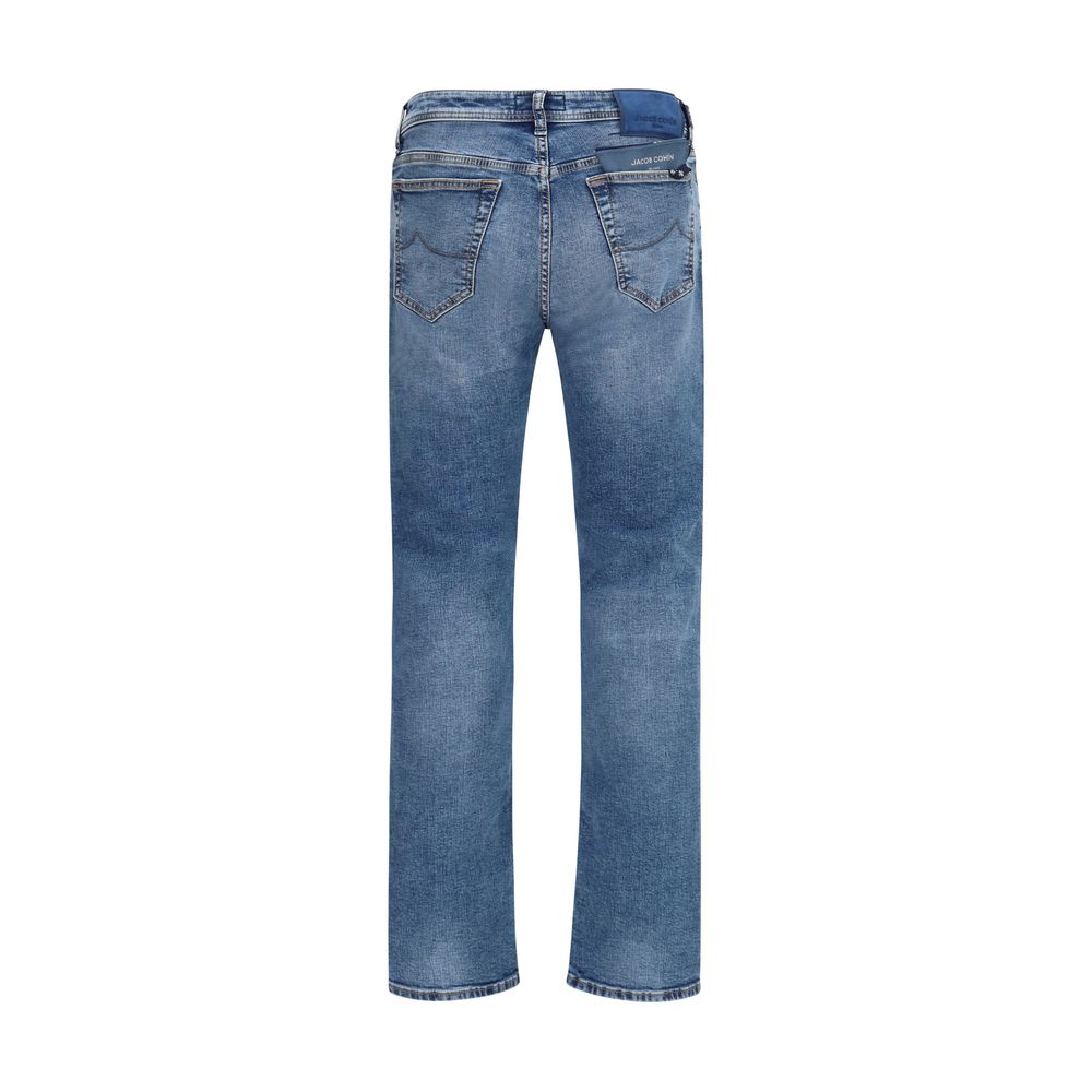 Jeans by Jacob Cohen for men in denim cotton & suede leather blue & signature presents a tailored silhouette, showcasing a tailored tapered-leg, regular-fit & slim and long cut with a refined mid rise for a truly tailored aesthetic.