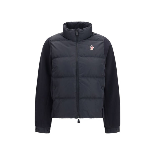 Windbreaker Jacket by Moncler Grenoble for women in goose down polyester & velour black & signature features an perennial silhouette with a refined high-neck neckline and perennial lightweight, pockets, insulated & windproof for a sophisticated weather-resistant look.
