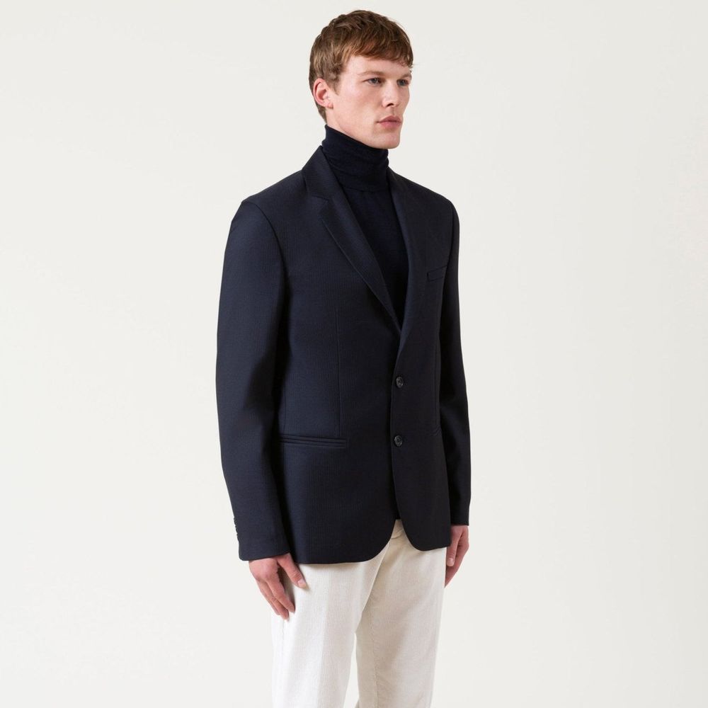 Overcoat by Autore for men in lana merino wool & viscose black & blue features an voluminous silhouette, showcasing distinct pockets and a voluminous for a truly voluminous aesthetic.