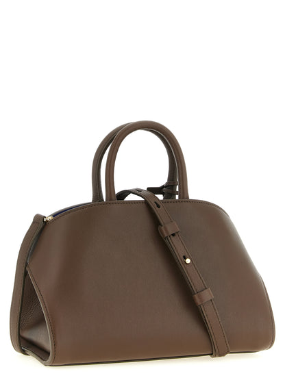 This Handbag by Ferragamo for women in bos taurus calfskin leather and bicolour, blue & brown presents a sculptural silhouette featuring a secure buckle, ample , and versatile detachable-strap for a sculptural finish.