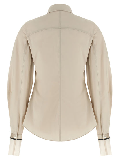 Blouse by Brunello Cucinelli for women in silk polyamide & cotton beige & signature features an architectural silhouette with a refined and elegant for a architectural look.