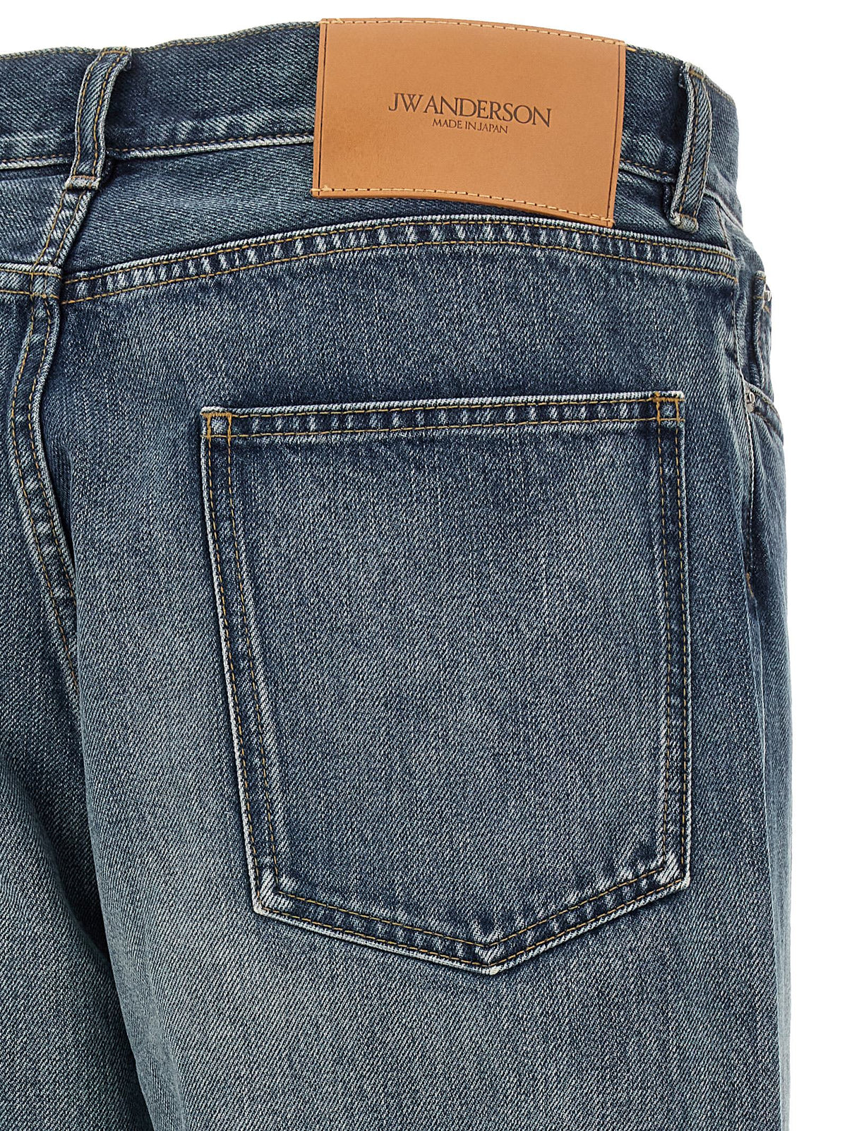 Jeans by J.W.Anderson for men in denim cotton blue features an sartorial straight-leg and long with a cut for a sartorial finish.