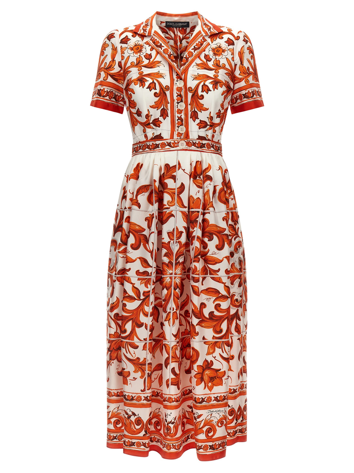 Dress by Dolce & Gabbana for women in silk twill orange & print features an sultry silhouette defined by a and short-sleeve, falling to an sultry midi short for a sultry look.