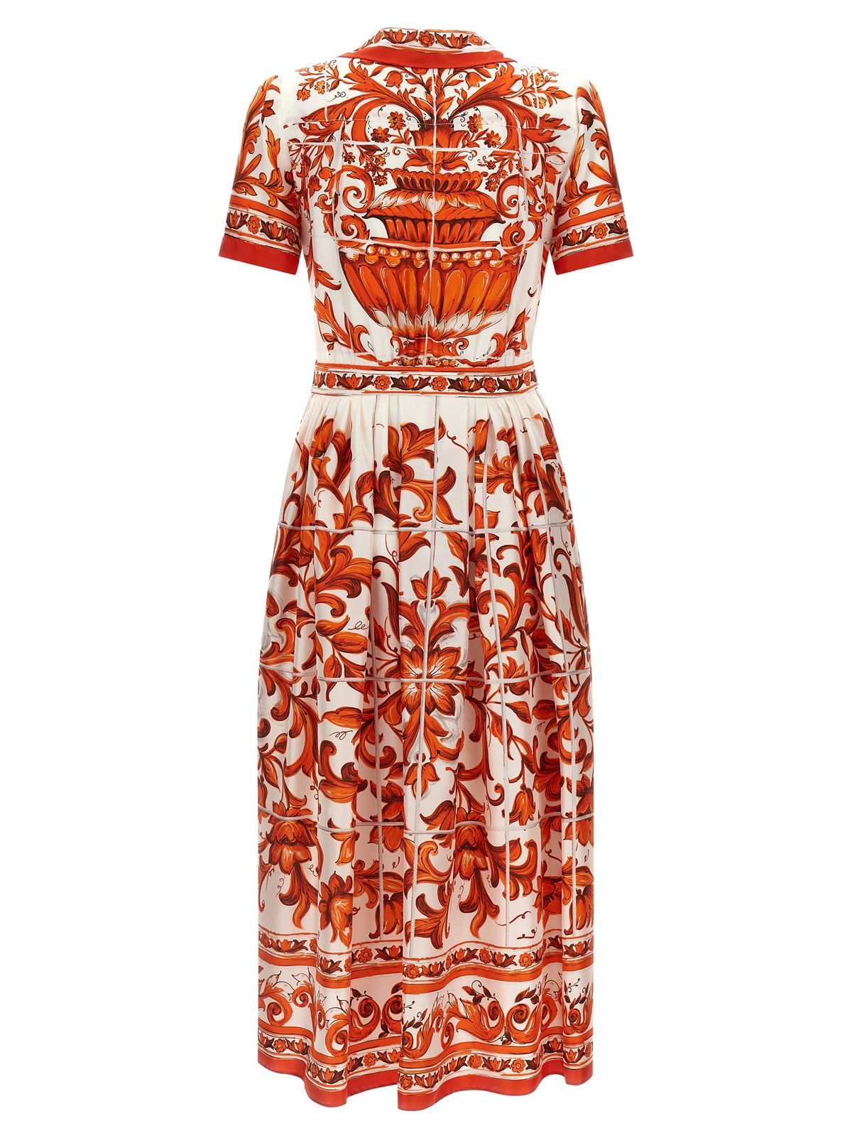 Dress by Dolce & Gabbana for women in silk twill orange & print features an magnificent silhouette, artfully detailed with a magnificent and that flows into an magnificent midi short.