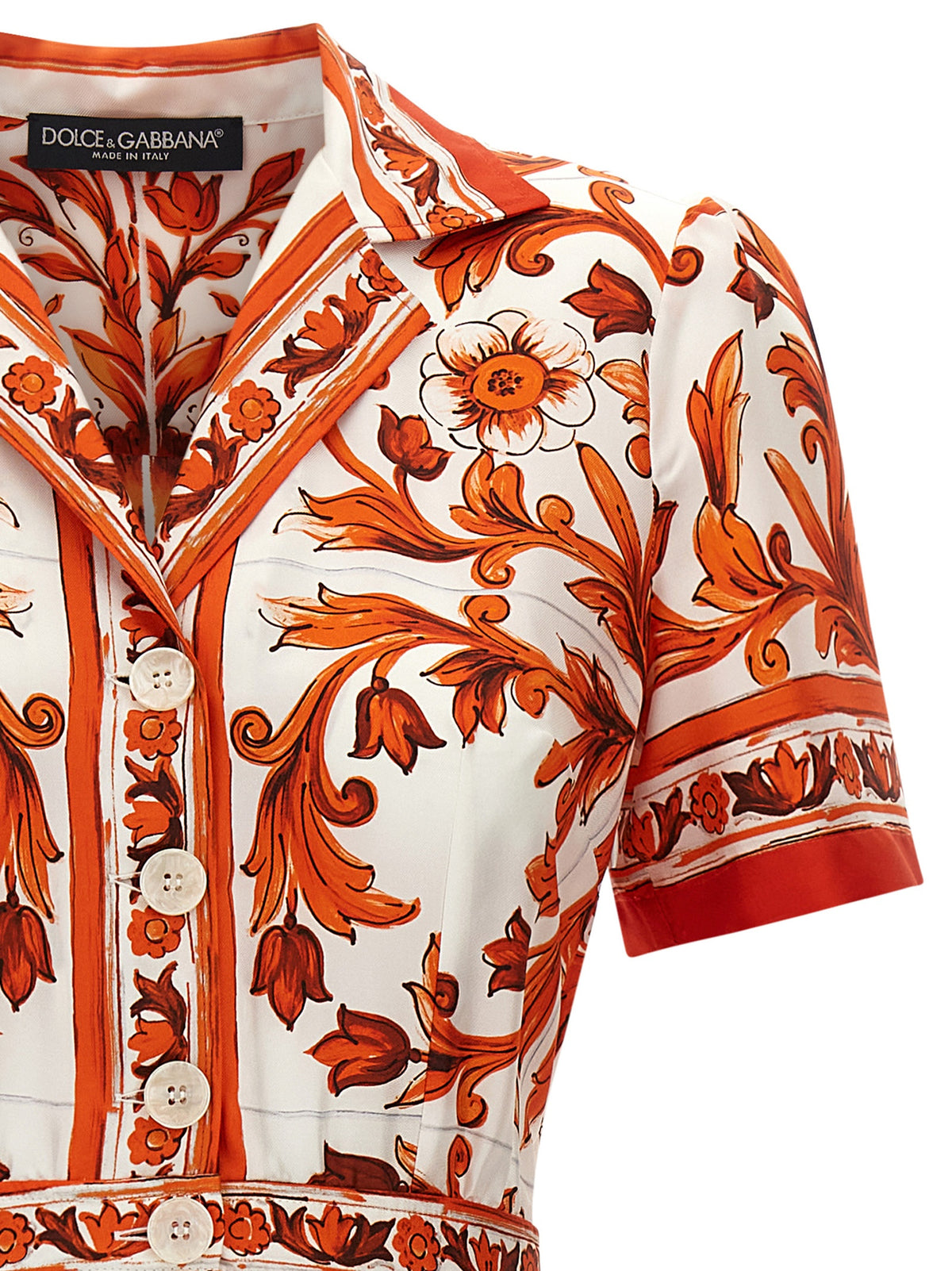 Dress by Dolce & Gabbana for women in silk twill orange & print features an eye catching silhouette with a sophisticated , elegant , and a refined midi short for a eye catching aesthetic.