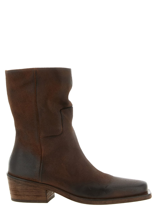 Ankle Chelsea Cowboy Boots by Marsell for women in suede calfskin leather brown features an high-performance silhouette, showcasing the sophisticated design of the Women's Suede Calfskin Leather Ankle Chelsea Cowboy Boots with a block-heel and a refined square toe style.