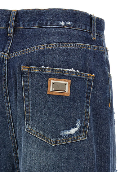 Jeans by Dolce & Gabbana for women in denim cotton dark-blue features an sartorial wide and long with a cut for a sartorial finish.