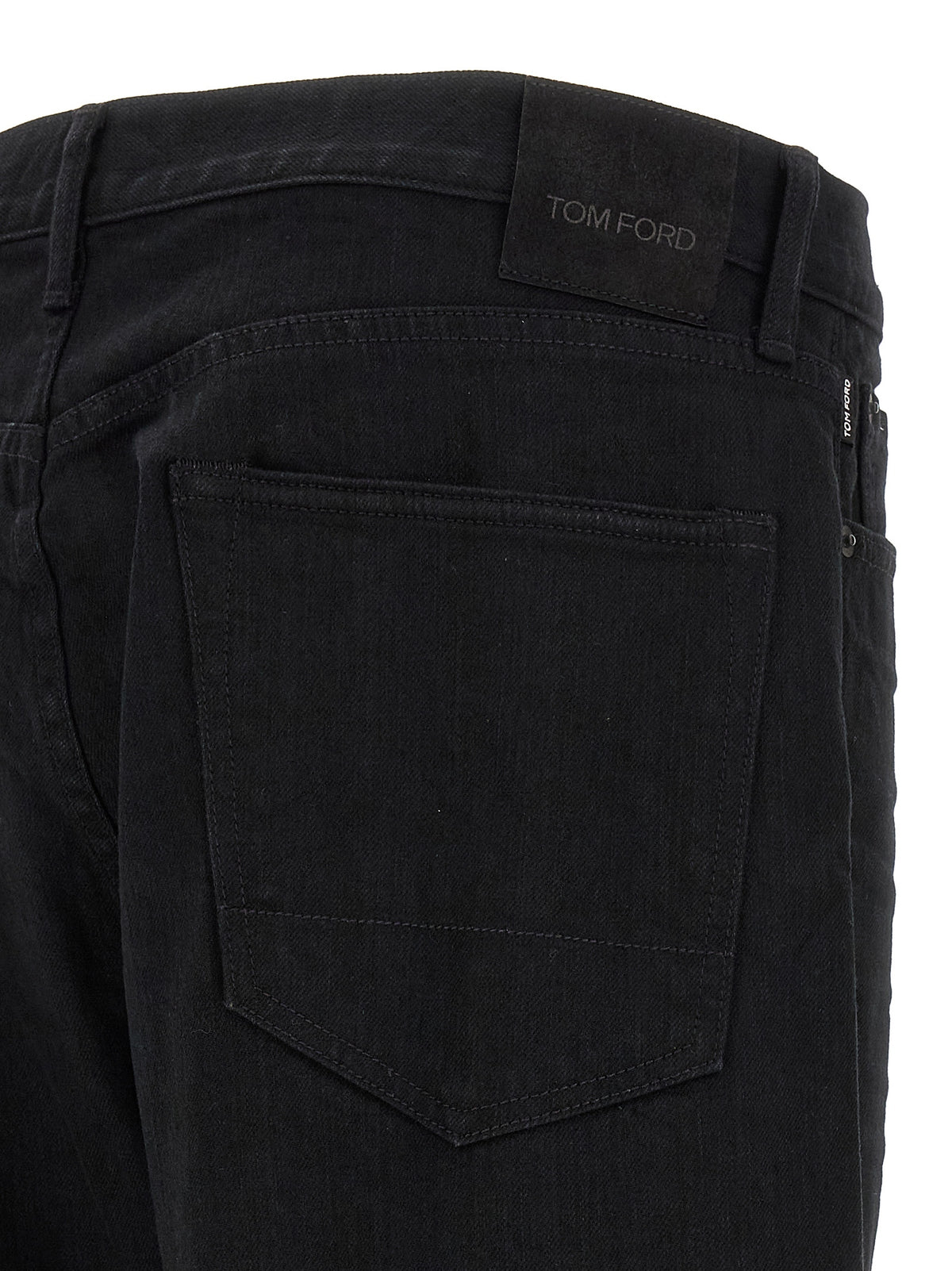 Jeans by Tom Ford for men in stretch denim cotton black & signature presents a tailored silhouette, showcasing a tailored straight-leg and long cut with a refined for a truly tailored aesthetic.