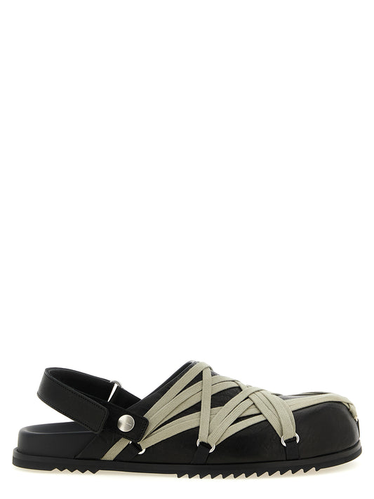 Mules Flat Shoes by Rick Owens for women in ramie & leather black showcases a enchanting silhouette as part of the Women's Ramie & Leather Mules Flat Shoes collection, defined by a enchanting and for a enchanting look.